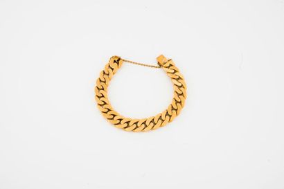 Bracelet gourmette en or jaune (750) à maille...