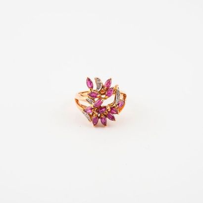 Bague en or jaune (750) ornée de rubis de...