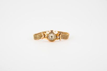 Montre bracelet de femme en or jaune (750)....