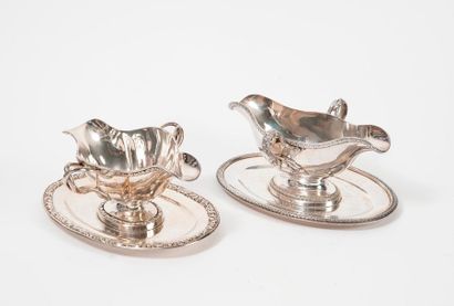 Deux saucières en argent (950) à deux becs...