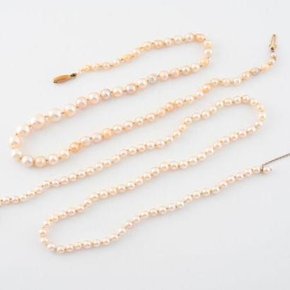 Two white cultured pearl necklaces:
- one...