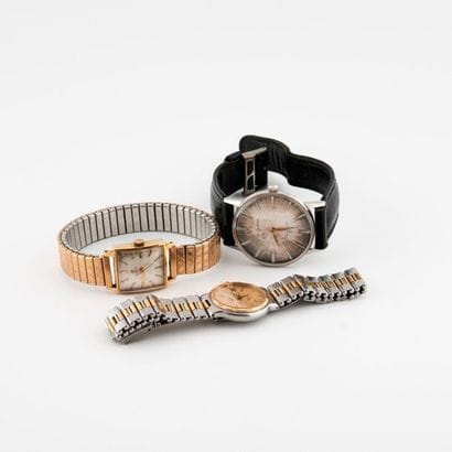 Set of three steel and gold metal watches...