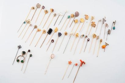 Four silver tie pins (min. 800) decorated...