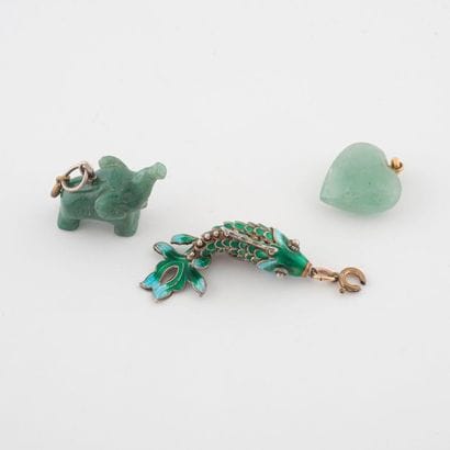 Three pendants:

- two heart-shaped or elephant...