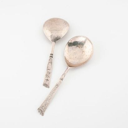Two silver spoons (min. 800), stems engraved...