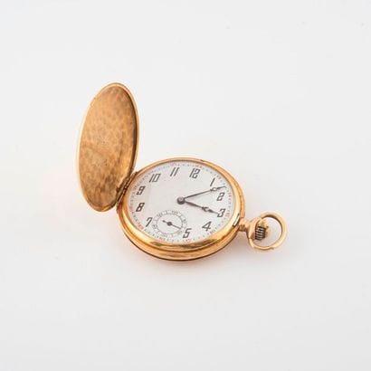Soap pocket watch in yellow gold (750).

Rear...