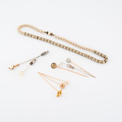 Four yellow gold (750) tie pins decorated...