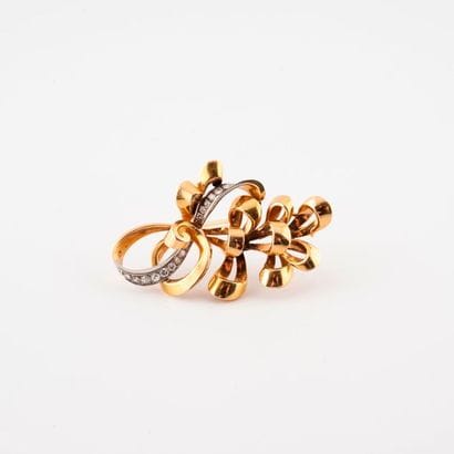 A yellow gold (750) spray brooch formed by...