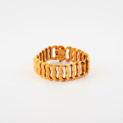 Articulated bracelet in yellow gold (750)...