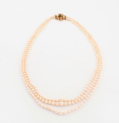 Three-row necklace of falling white cultured...