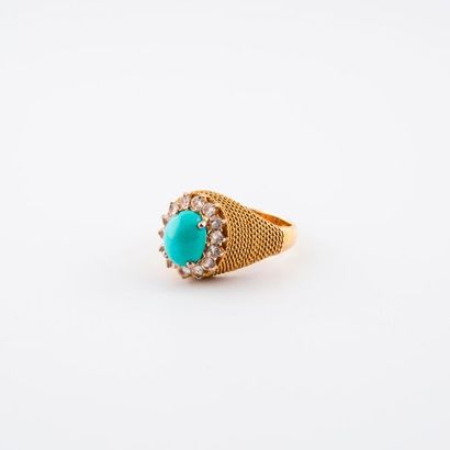 Yellow gold (750) dome ring centered with...