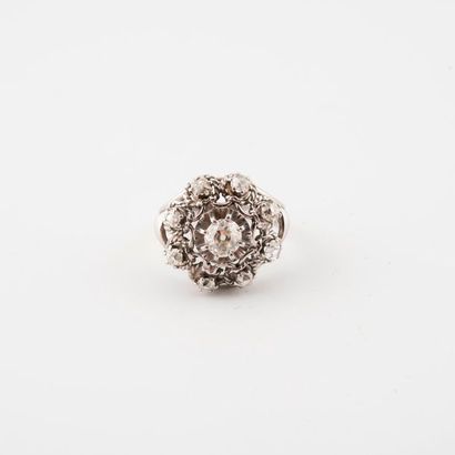 An openwork white gold (750) flower ring...