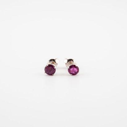 Pair of white gold (750) ear studs with round...