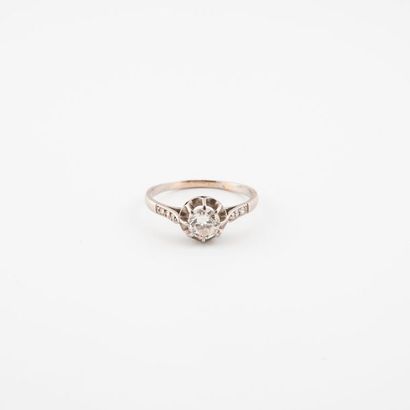 Solitaire platinum ring (850) centered with...