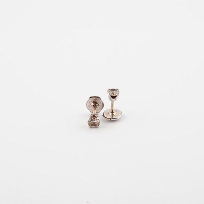 Pair of ear studs in white gold (750) adorned...