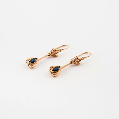 Pair of earrings in yellow gold (585) adorned...