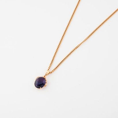 Yellow gold pendant (585) holding between...