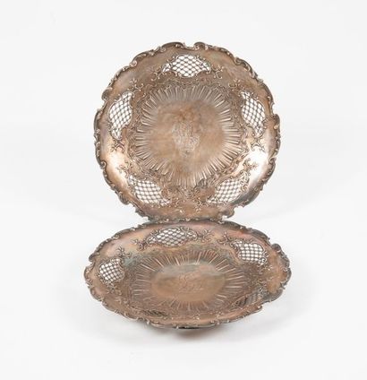Two display dishes, circular on moulded silver...