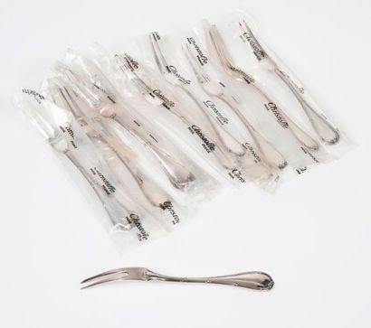 Series of twelve snail forks, net and cross...