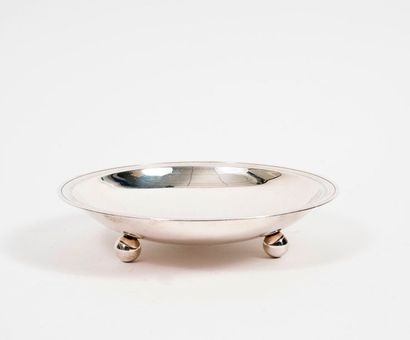 Circular bowl with silver plated metal pocket-emptying...