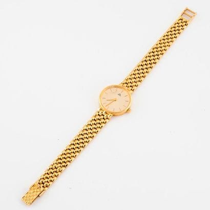 Ladies' bracelet watch in yellow gold (750).

Round...