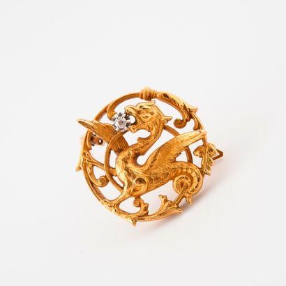 Broche circulaire en or jaune (750) ajourée,...