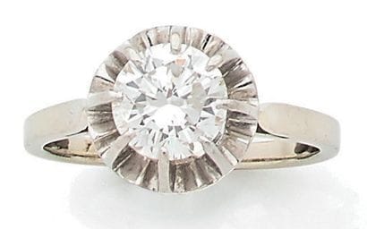 Bague solitaire en or gris (750) et platine...