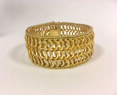 Bracelet ruban en or jaune en partie amati...