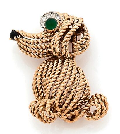 BOUCHERON Paris
Lapel clip depicting a yellow...