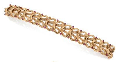 Bracelet articulé à trois filins d'or jaune...