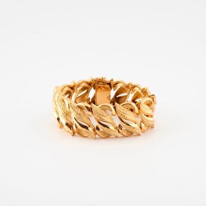Bracelet ruban articulé en or jaune (750)...