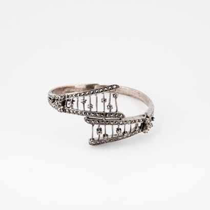 Bracelet jonc ouvrant en argent (800) ajouré,...