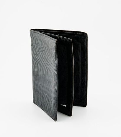 HERMES Paris


Portefeuille en lézard noir....