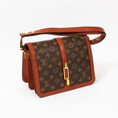 LOUIS VUITTON


Sac en cuir monogram à rabat,...