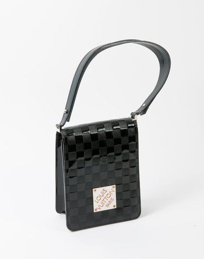 Louis VUITTON, Club Damier


Sac rectangulaire...