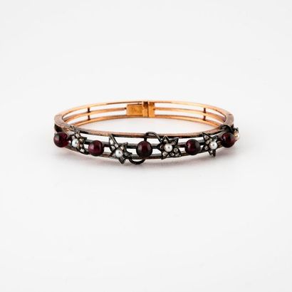 Bracelet jonc ouvrant en or rose (750) et...