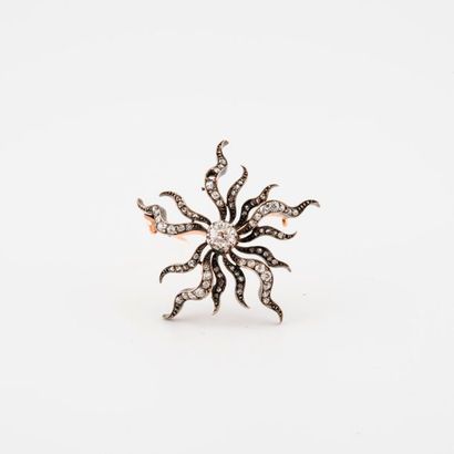 Stylized flower brooch in gold (750) and...