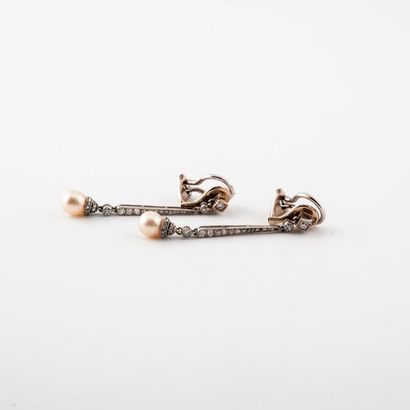 Pair of earrings in two-tone (750) gold decorated...
