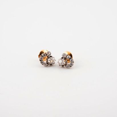Pair of yellow gold (750) and platinum (850)...