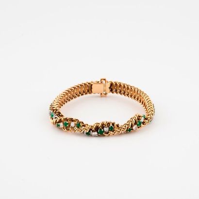 Partially twisted yellow gold bracelet (750)...