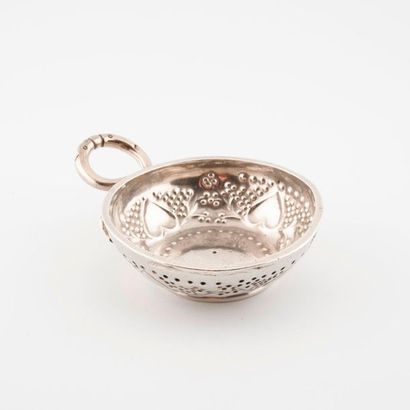 
A silver tastevin (950) with a snake ring...