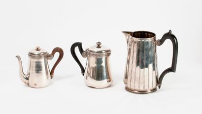 
Three silver shaped pieces (950):

- A broc...