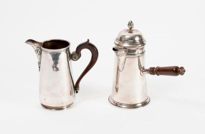 
Two shaped pieces in silver (950):

- A...