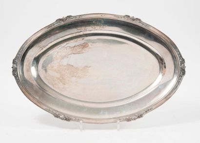 
Oval silver dish (950) with contoured edges...