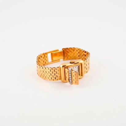 OMEGA


Lady's bracelet watch in yellow gold...