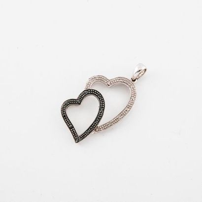 Pendant two interlaced hearts in white gold...
