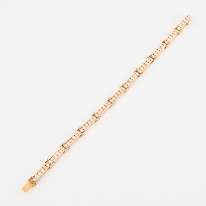Articulated line bracelet in yellow gold...