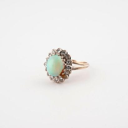 Ring in rhodium-plated yellow gold (585)...
