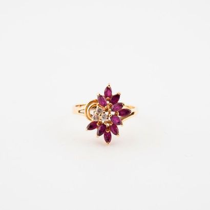 Ring featuring a stylized flower in yellow...