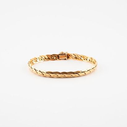 Articulated bracelet in yellow gold (750)...